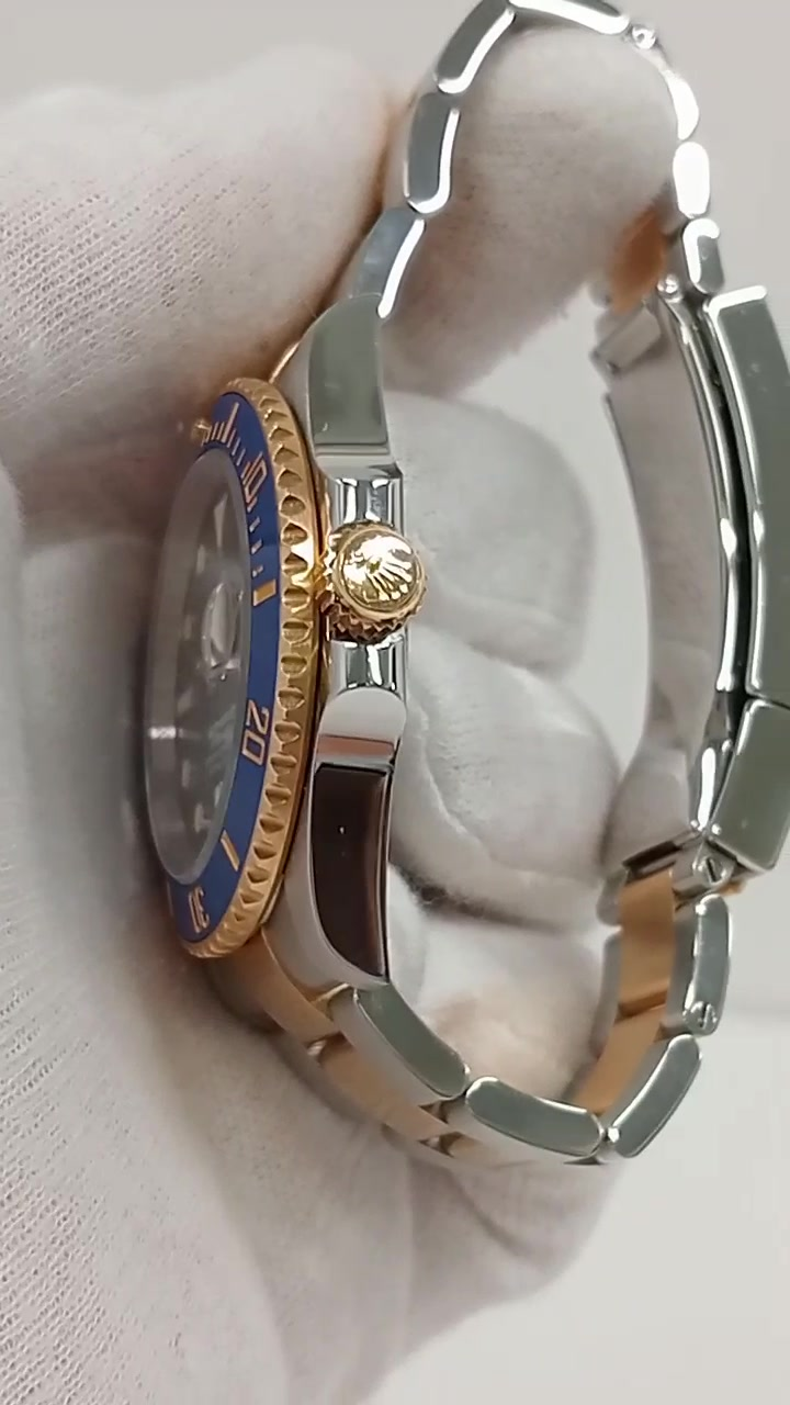 Rolex Submariner Ref 126613LB stock 28796 Crown side from vendor video