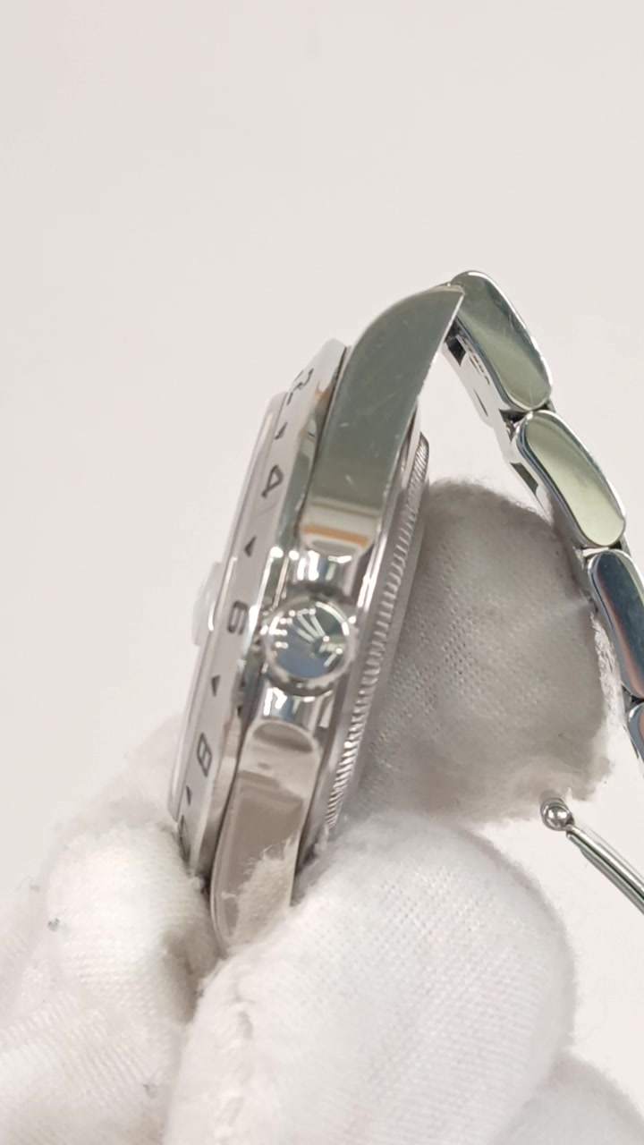 Rolex 16570 stock 34060 Crown side from vendor video