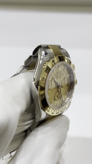 Rolex Daytona Steel and Yellow Gold — Side angle; stock 34355