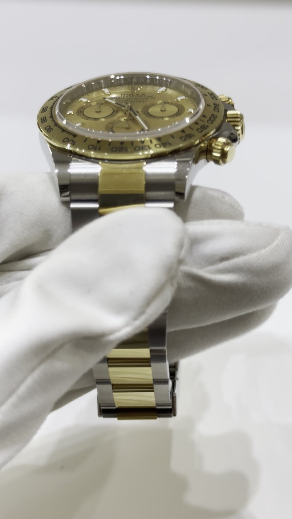 Rolex Daytona Steel and Yellow Gold — Case and bezel profile; stock 34355