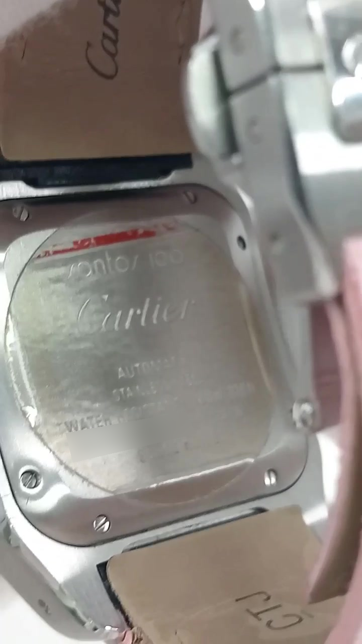 Cartier Santos stock 35431 — Caseback from vendor video