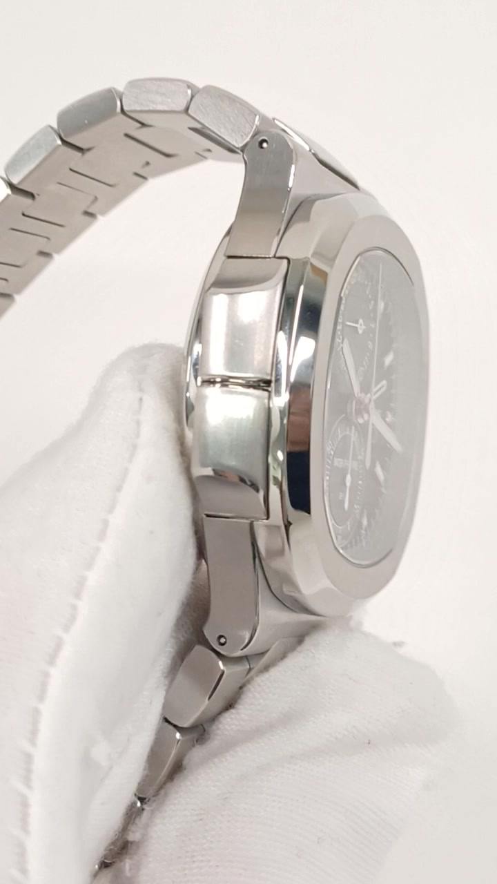 Patek Philippe Nautilus Travel Time stock 36934 — Travel Time pusher side from vendor video