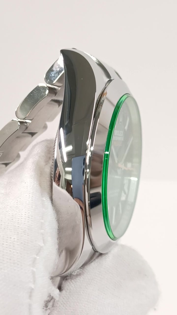 Rolex Milgauss Green Crystal — Side profile; stock 40417
