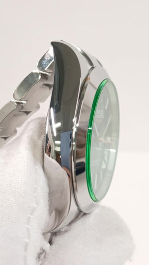 Rolex Milgauss Green Crystal — Side profile; stock 40417