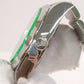 Rolex Milgauss Green Crystal — Crown side; stock 40417