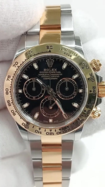 Rolex Daytona Steel and Yellow Gold — Front; stock 42873