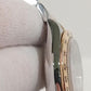 Rolex Daytona Steel and Yellow Gold — Side profile; stock 42873