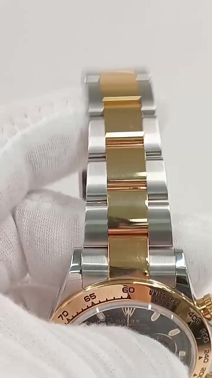 Rolex Daytona Steel and Yellow Gold — Bracelet; stock 42873