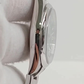 Rolex Oyster Perpetual stock 48910 — Case side from vendor video