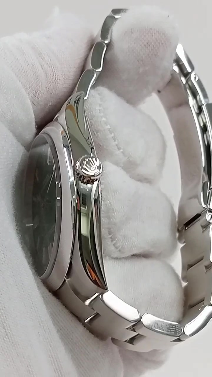 Rolex Oyster Perpetual stock 48910 — Crown side from vendor video