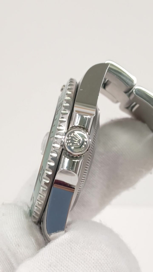 Rolex Submariner Ref 126610LV stock 51134 Crown side from vendor video