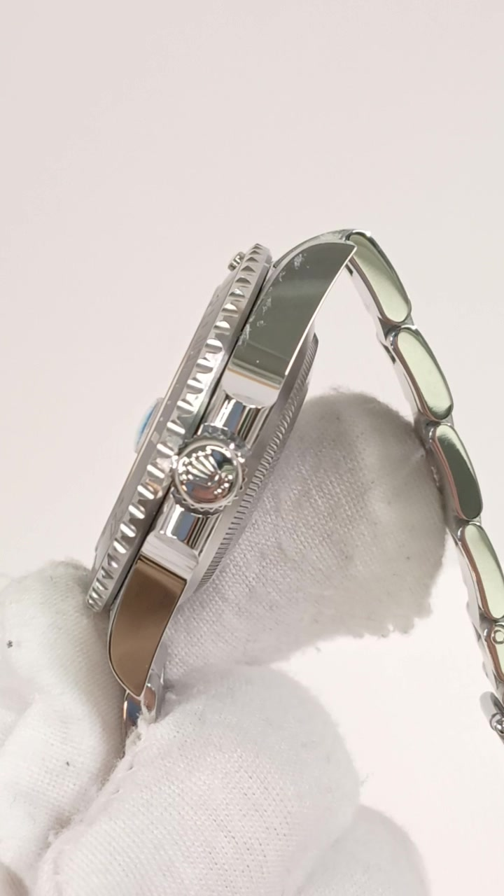 Rolex Submariner Ref 126610LN stock 61275 Crown side from vendor video