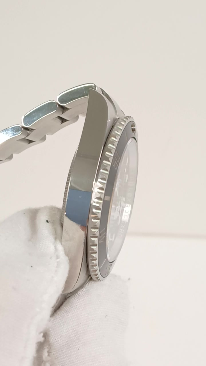 Rolex Submariner stock 61515 — Case side from vendor video