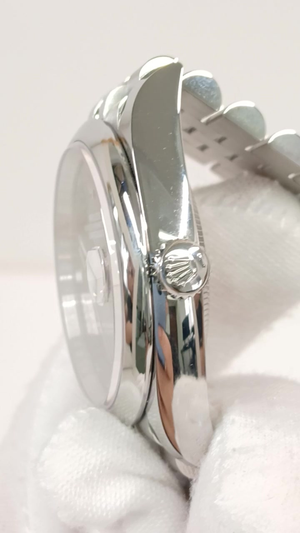 Rolex 126200 stock 63385 Crown side from vendor video