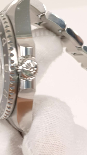 Rolex 126710GRNR stock 63801 Crown side from vendor video