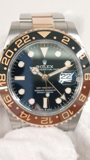 Rolex GMT-Master II Ref 126711CHNR stock 64362 Front from vendor video