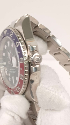 Rolex 116719BLRO stock 64620 Crown side from vendor video
