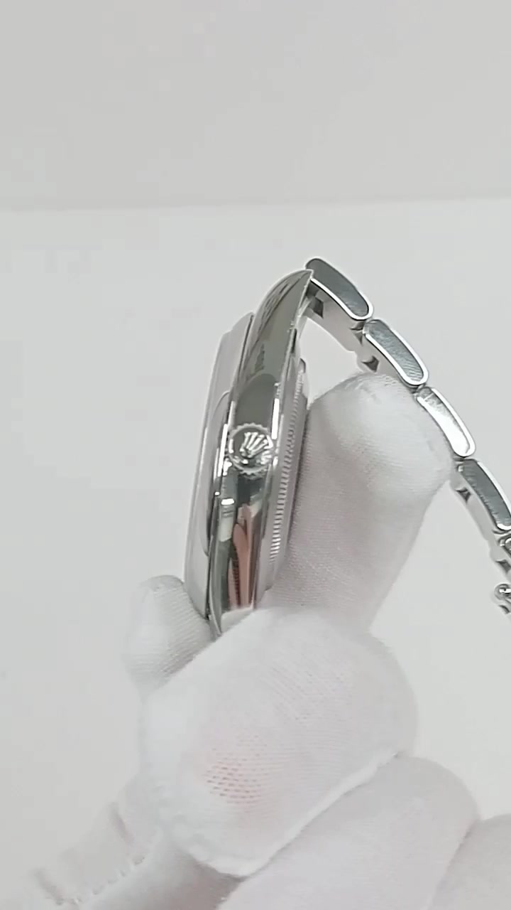 Rolex Oyster Perpetual stock 65131 — Crown side from vendor video