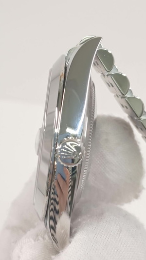 Rolex 126300 stock 65186 Crown side from vendor video
