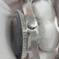 Omega Planet Ocean stock 67688 — Crown side from vendor video