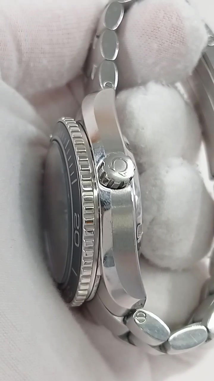 Omega Planet Ocean stock 67688 — Crown side from vendor video
