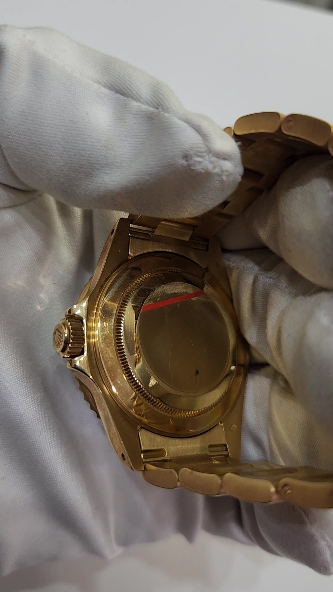 Rolex stock 68564 Caseback and crown from vendor video