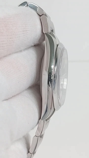 Rolex Oyster Perpetual Ref 134300 stock 75406 Case side from vendor video