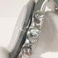 Rolex 116500LN stock 77734 Crown side from vendor video
