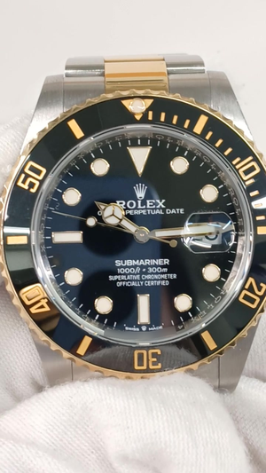 Rolex Submariner Ref 126613LN stock 78902 Front from vendor video