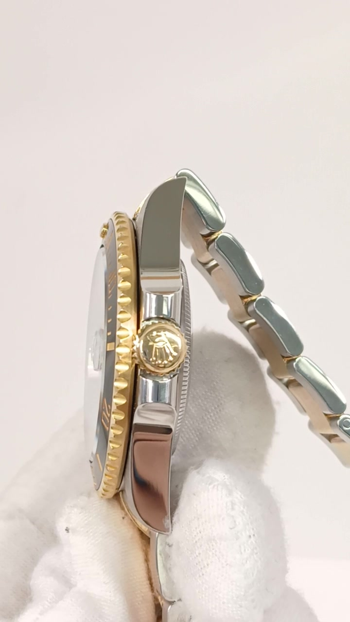 Rolex Submariner Ref 126613LN stock 78902 Crown side from vendor video