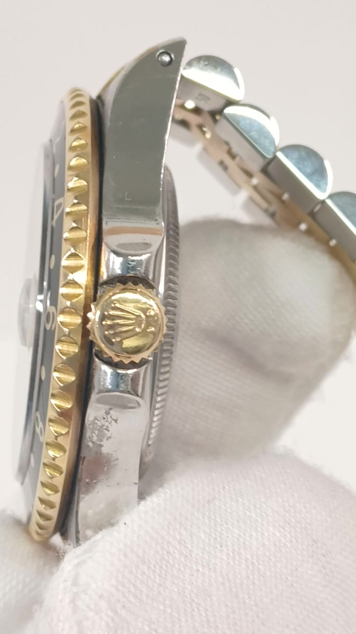 Rolex 16713 stock 79362 Crown side from vendor video