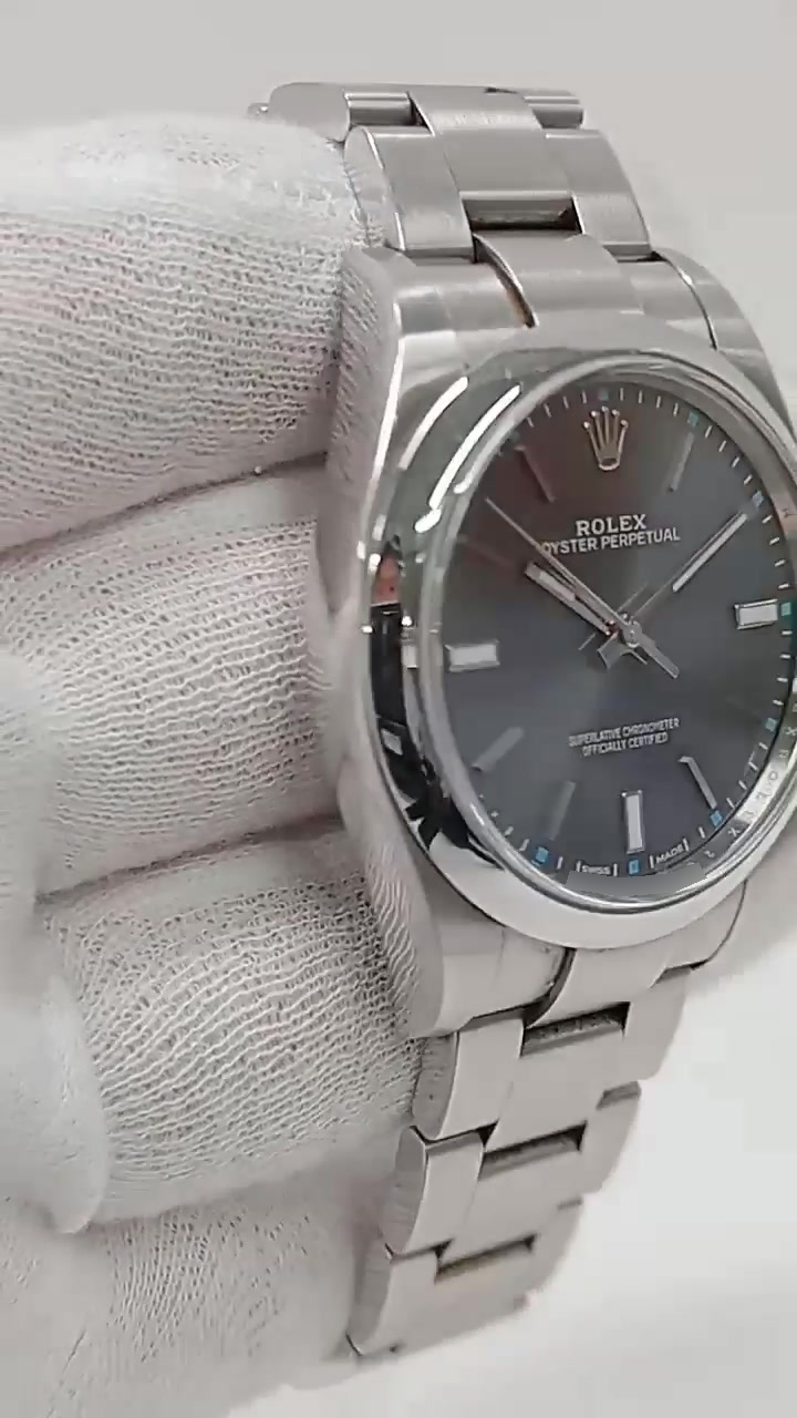 Rolex Oyster Perpetual 39mm Steel — Side angle; stock 85822