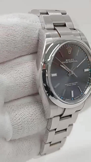 Rolex Oyster Perpetual 39mm Steel — Side angle; stock 85822