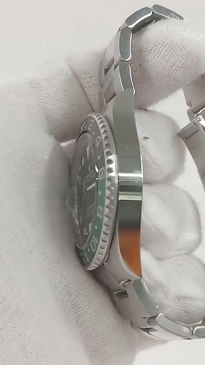 Rolex GMT-Master II Ref 126720VTNR stock 87028 Case side from vendor video
