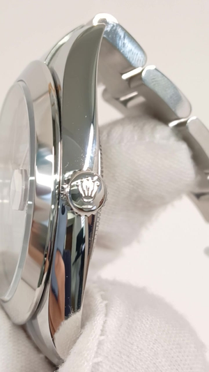 Rolex 126300 stock 88774 Crown side from vendor video