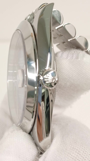Rolex 126300 stock 90731 Crown side from vendor video