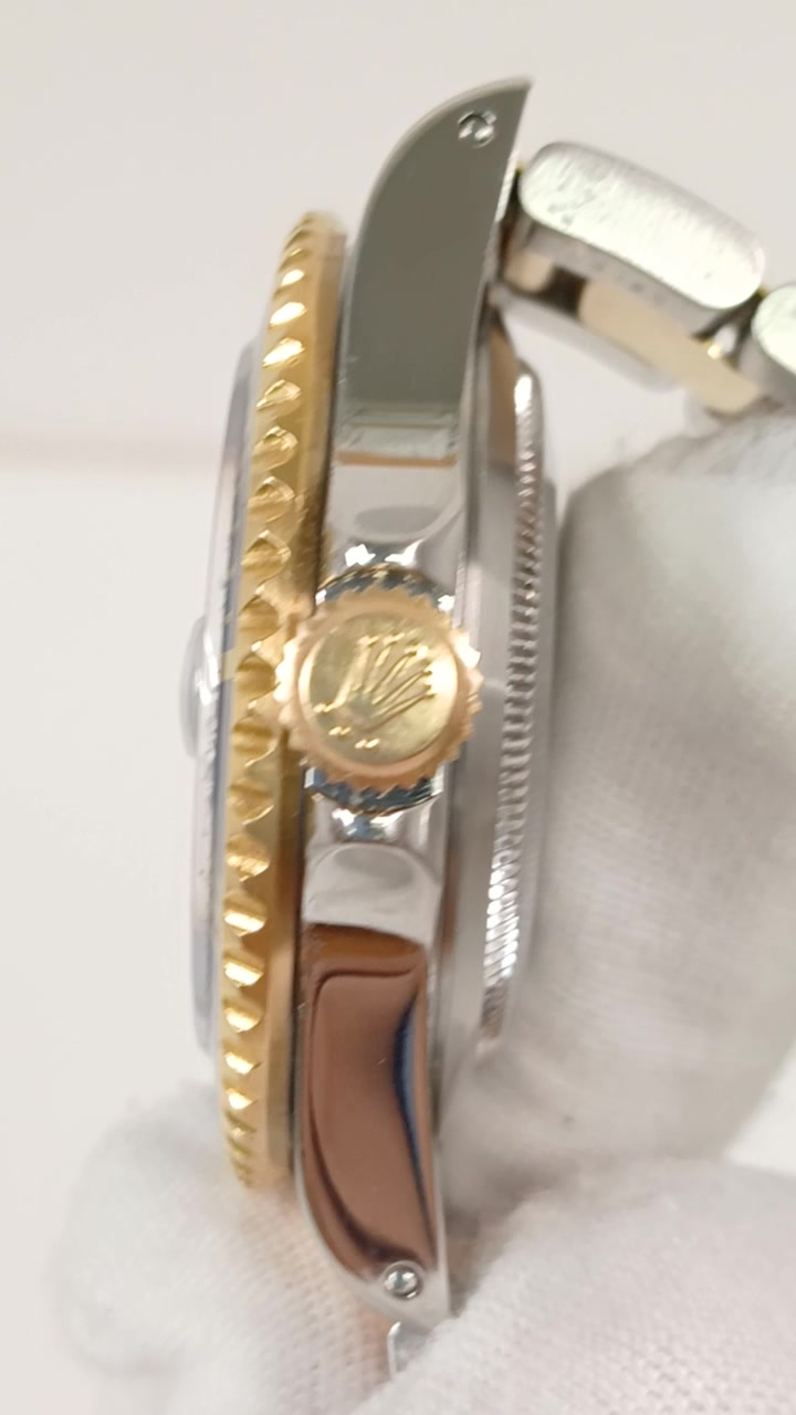 Rolex 16613 stock 92562 Crown side from vendor video