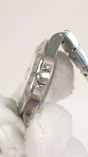 Rolex 16570 stock 96103 Crown side from vendor video